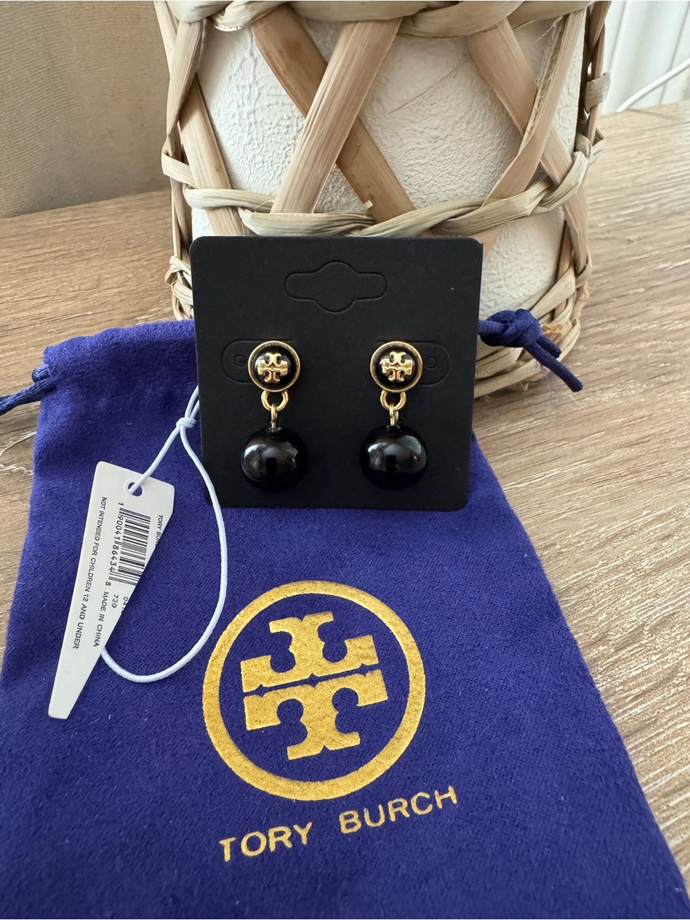 Like new - Black and Gold Tory Burch stud earrings 2.5 cm drop and 1cm on logo